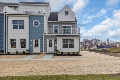 View of front of home featuring a balcony
