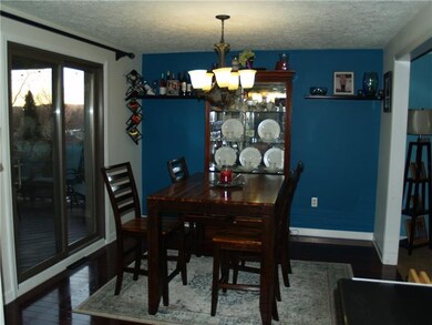 Dining Room with sliding glass doors allowing endl