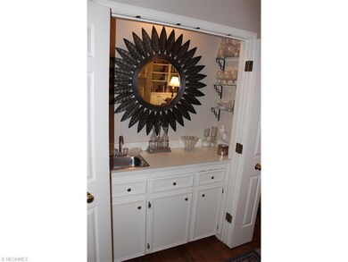 Convenient wet bar is in the Great Room.