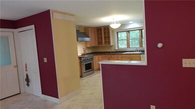 Dining area with sliders, open to...