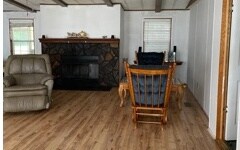 great room with wood burning fireplace