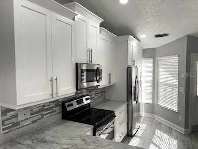 3198 Claremont Place unit A, Palm Harbor, FL 34683 - photo 6