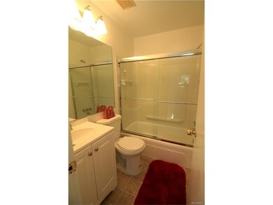 New vanity, light fixture, toilet, tub surround, g