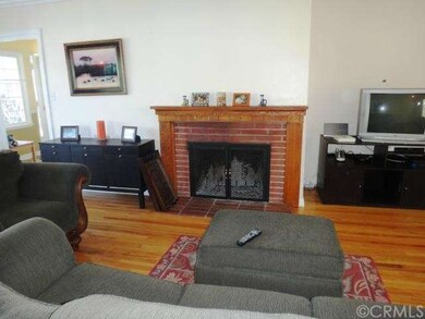 The WOOD-BURNING fireplace adds so much warmth and