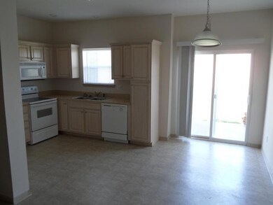 Eat-in kitchen with slider to back porch.