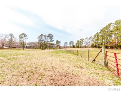 12 acres..8 acres of pasture...wooden and solar el
