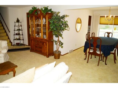 View of dining / living combo. Slider off dining r