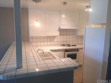 Kitchen has lots of counter space and storage