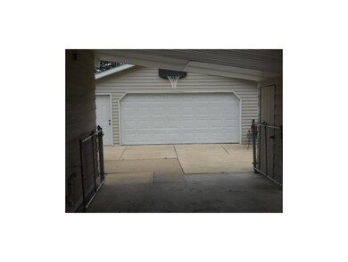Garage. Through carport
