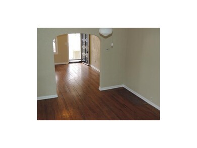 Hardwood floors in living room and dining room. Ar