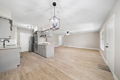 Here in the breakfast nook you are seeing both Kitchen and entertaining spaces.