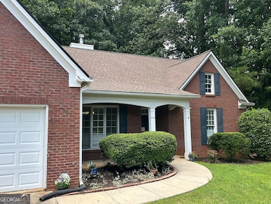 level sidewalk and seamless front entrance - this home is beautiful and easily accessible