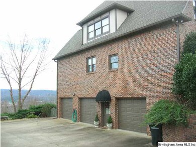 Three car garage provides a place for multiple veh