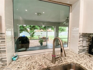 View from the under counter mounted sink.  Touch free faucet.