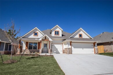 Craftsman-style house featuring a front yard and a