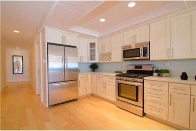 Custom quartz countertops with antique white shake