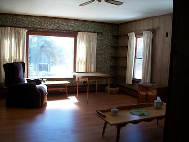 Living room has newer flooring...