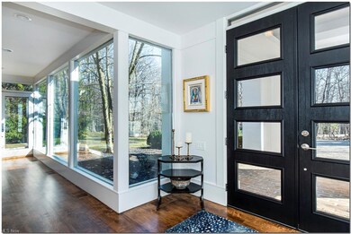 Enter the impressive foyer where every window fram
