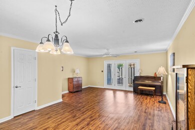 Living room featuring hardwood / wood-style floori