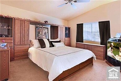 Spacious master suite accented with neutral colors