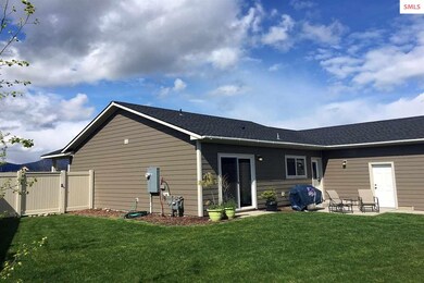 The Back Yard Is Fenced,  Landscaped & Tidy - Read