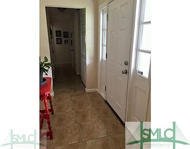 Foyer. Formal foyer offers tile flooring, which co