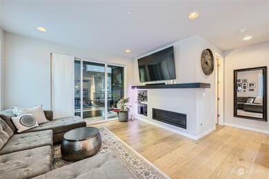 A cozy gas fireplace invites relaxation in the living room.