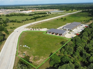 Aerial view of sparsely populated area featuring p