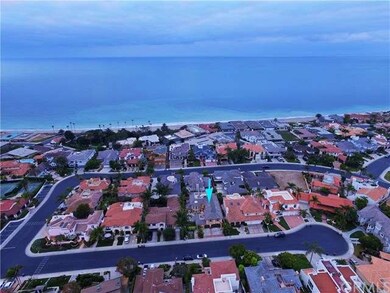 Coastal drone view of Establo cul-de-sac, clubhous