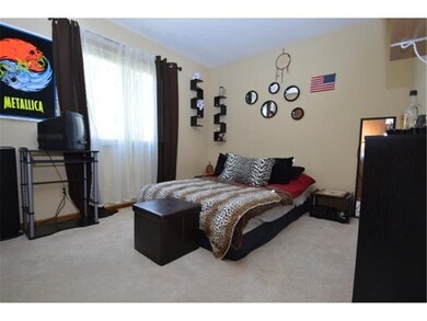 One of three upper level bedrooms