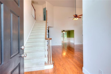 Entrance featuring two story foyer.