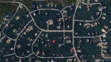 This oversized lot is in an area of high-quality c