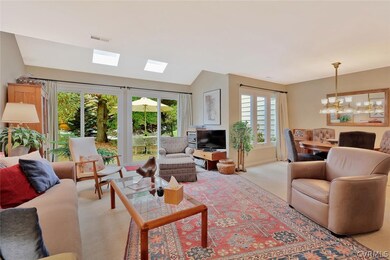 Double sliding glass doors open to back patio and