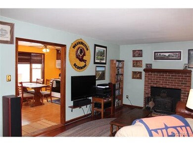The living room opens to the kitchen for entertain