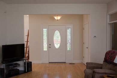 Foyer opens to the living room