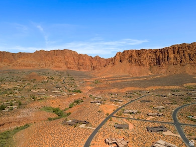 View of mountain backdrop featuring a desert landscape