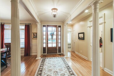 Intricate trim and details surround you as you enter the foyer.