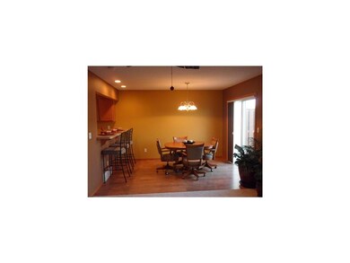 Dining Area. Dining area with wood flooring and sl
