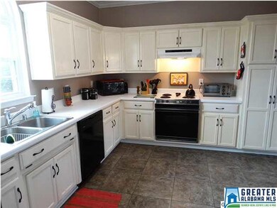 Kitchen has ample cabinet space.