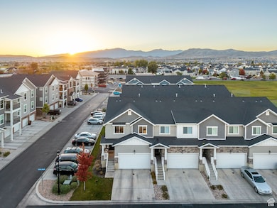 Aerial view at dusk of a residential view and a mountain view