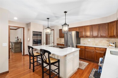 Current owner installed a new island, quartz tops,