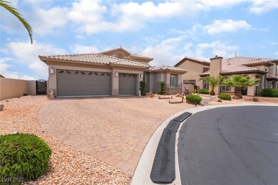 Mediterranean / spanish-style home with a gate, a