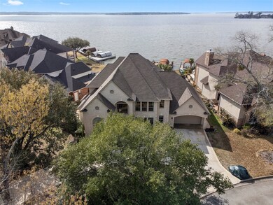 Located on a highly-coveted lake lot, this home is situated on a quiet street and offers expansive views of Lake Conroe.