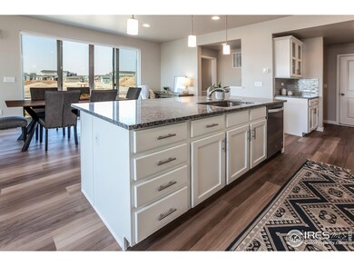 EXAMPLE PHOTO: KITCHEN ISLAND OPEN TO DINING ROOM
