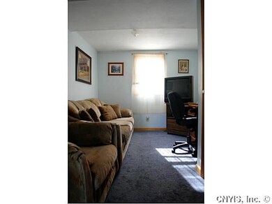 Den. This home has beautiful natural light.
