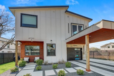Contemporary home featuring board and batten sidi