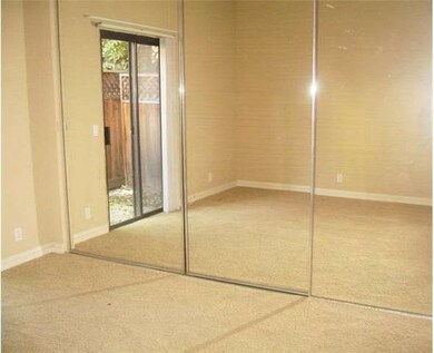 Closets line one whole side of the master bedroom.