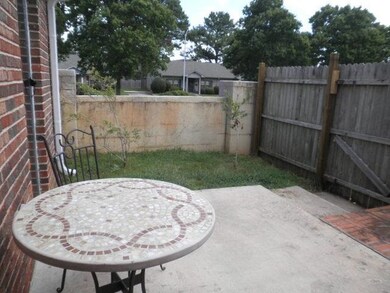 Looking the other direction, there is a small yard area for gardening or pets.