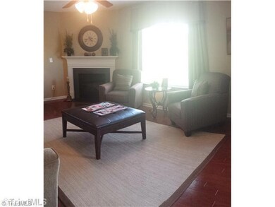 Den/Family/Great Room. This is a decorated model of the Vivian floor plan and not the actual home. Decorative paint, home decor and furniture is not included in actual home. To demonstrate the floor plan only.