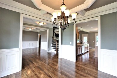 Formal Dining Room With Access To Kitchen